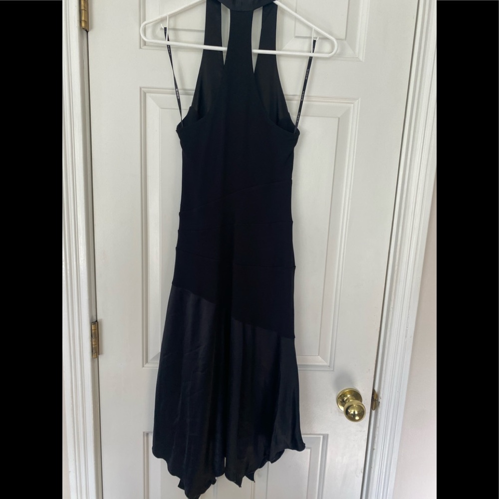 Bebe black short flowy halter style dress. Size small, flattering fit. Prom?